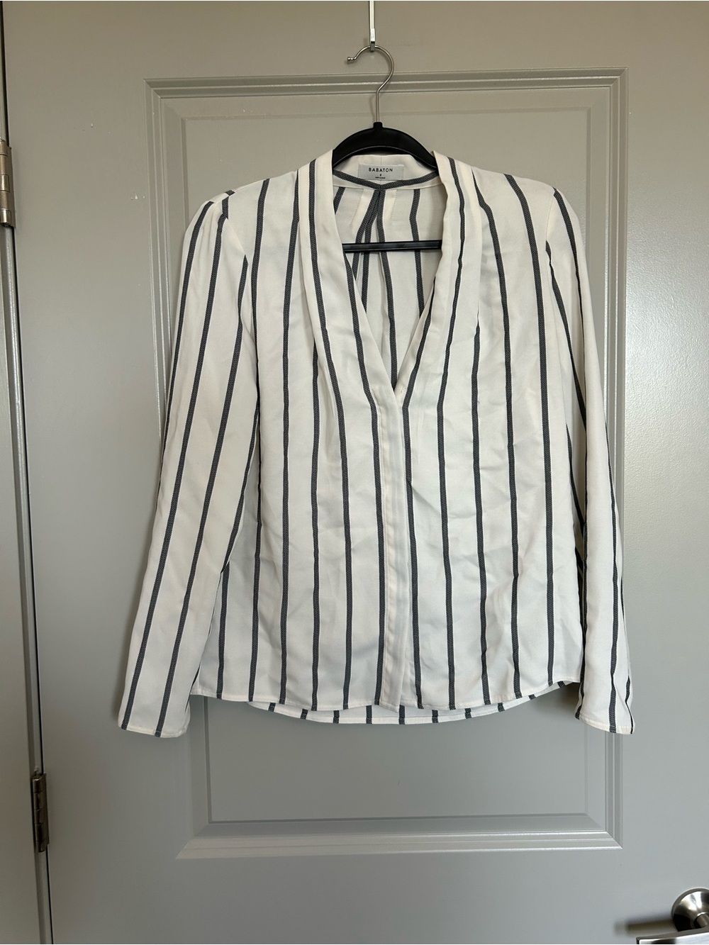 Babaton Women’s White Blouse with Black Vertical Stripes